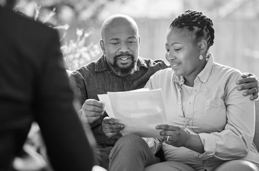 Couple reading documents